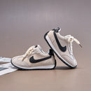 Nike valiant white infantil