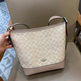 Coach Jude Duffle Bag em Signature Canvas Khaki Claro Ferragens Prata