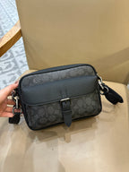 Bolsa Transversal Coach Warner em Canvas Signature Black