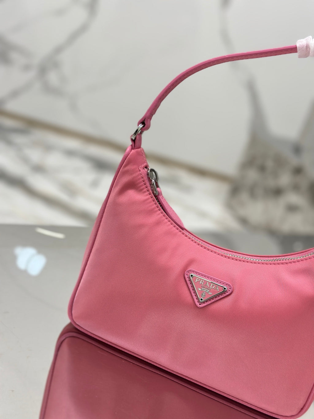 Bolsa Prada mini Re-Edition 2000