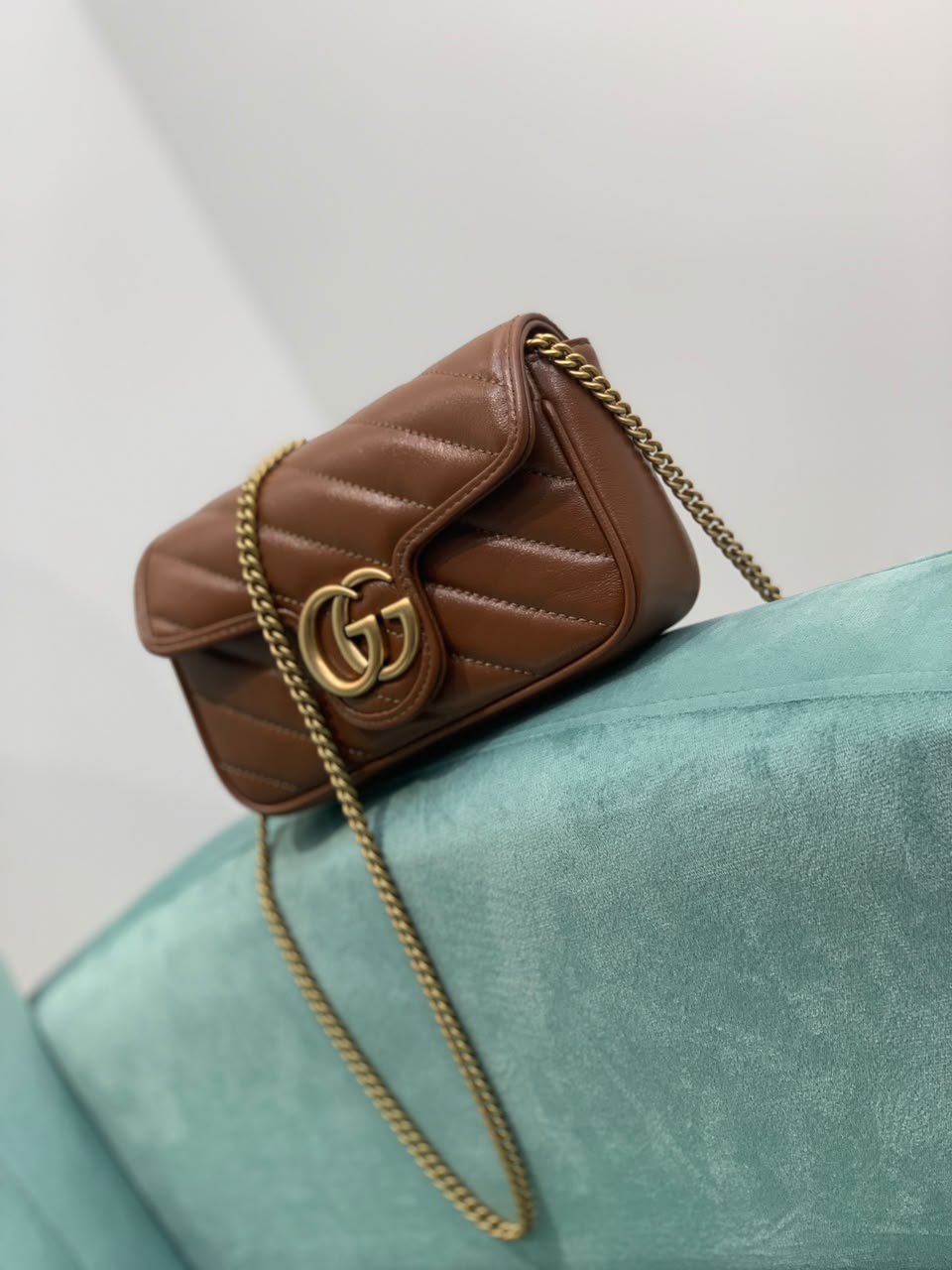 Bolsa GG Marmont Mini Matelassê Chevron Marrom