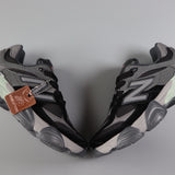 New Balance black infantil