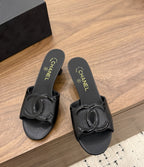 Chanel Interlocking CC Heeled Mules Black. Salto 5 cm.