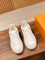 LV Time Out Debossed Monogram Signature White
