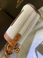 Delvaux Pin Mini Bucket Canvas Caramelo
