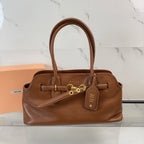 Bolsa Miu Miu Aventure Carvalho.