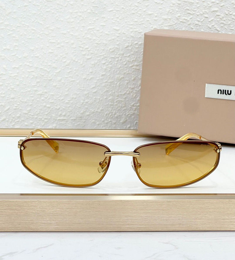 Óculos Miu Miu Gold