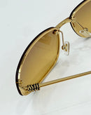 Óculos Miu Miu Gold