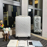 Mala Dior And Rimowa Carry-On Suitcase