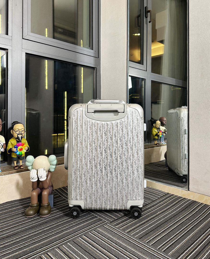 Mala Dior And Rimowa Carry-On Suitcase