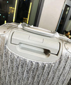 Mala Dior And Rimowa Carry-On Suitcase