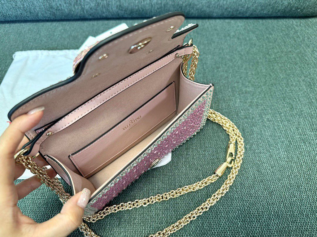 Valentino Garavani Locò Shoulder Bag With Rhinestones.