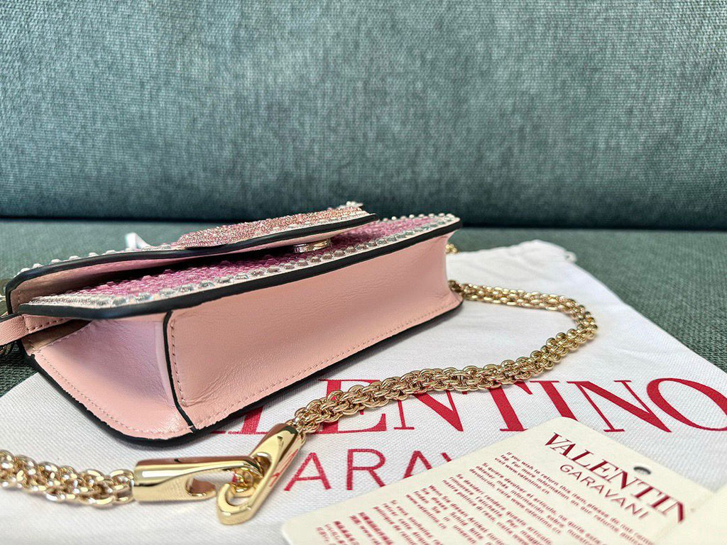 Valentino Garavani Locò Shoulder Bag With Rhinestones.