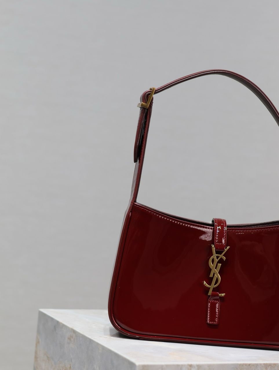 Yves Saint Laurent Mini Le 5 to 7 in Patent Leather Grenade