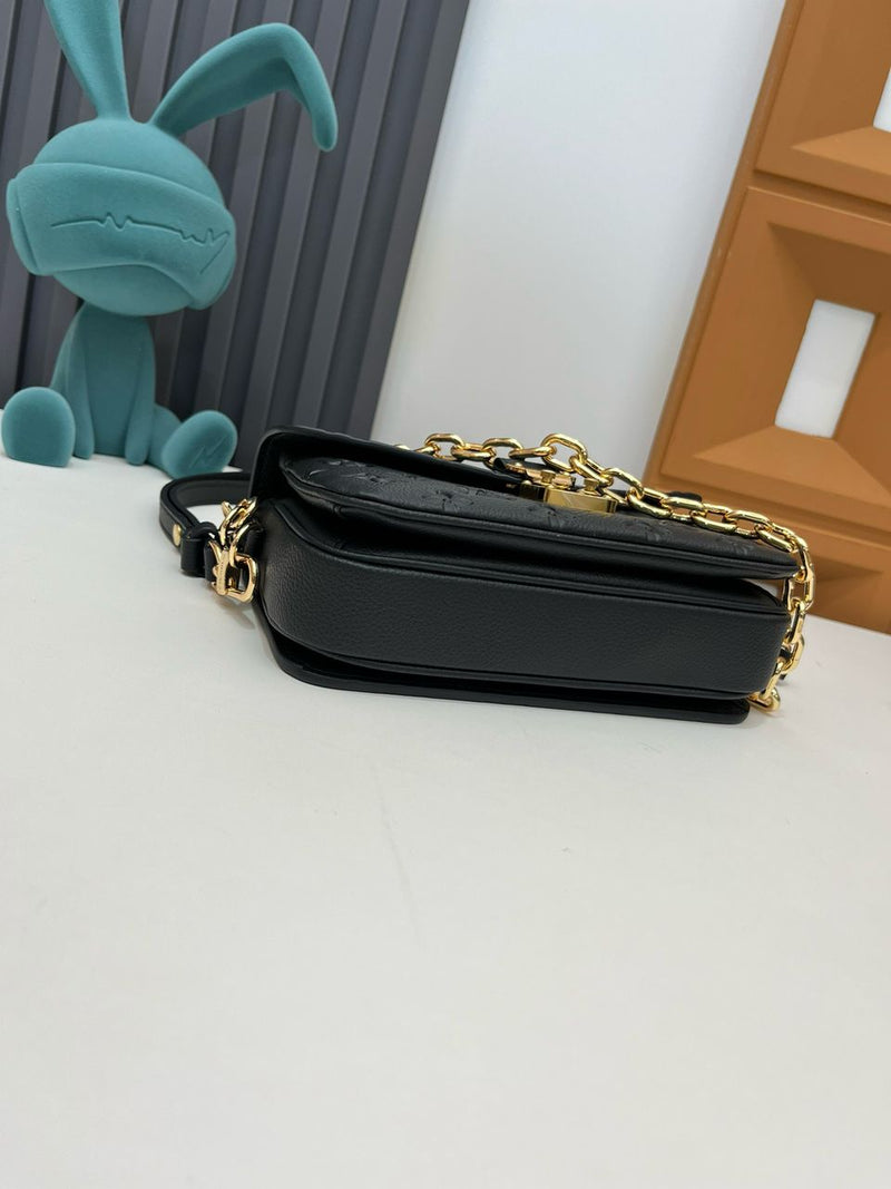 Pochette Métis East West Monogram Empreinte Black