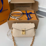Pochette Métis East West Monogram Empreinte Cream