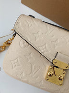 Pochette Métis East West Monogram Empreinte Cream