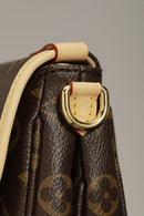 Bolsa Saumur BB Monogram Brown