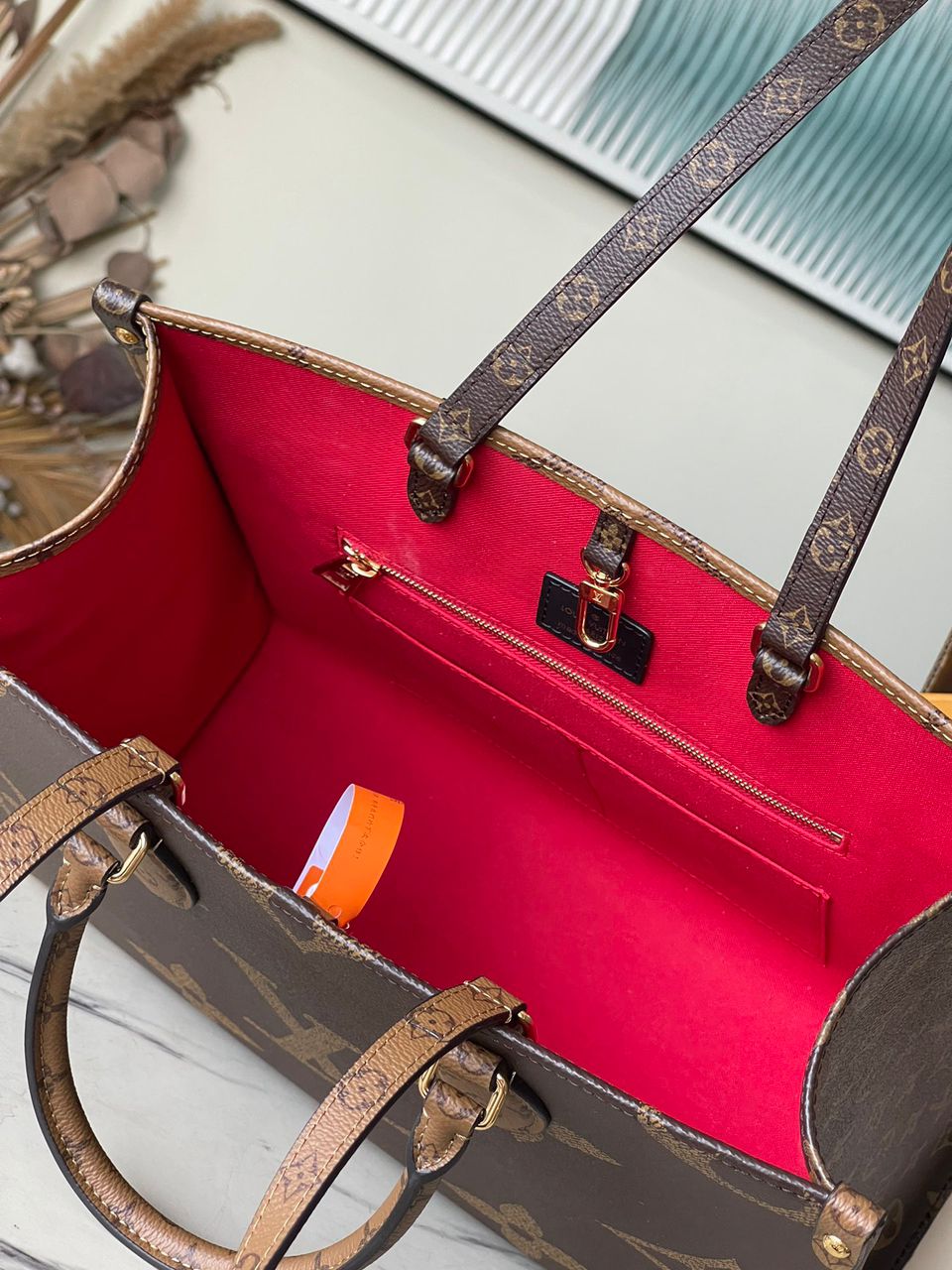 LV OnTheGo Reverse Monogram