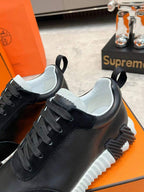 Hermès Bouncing Sneaker  Preto e Branco.