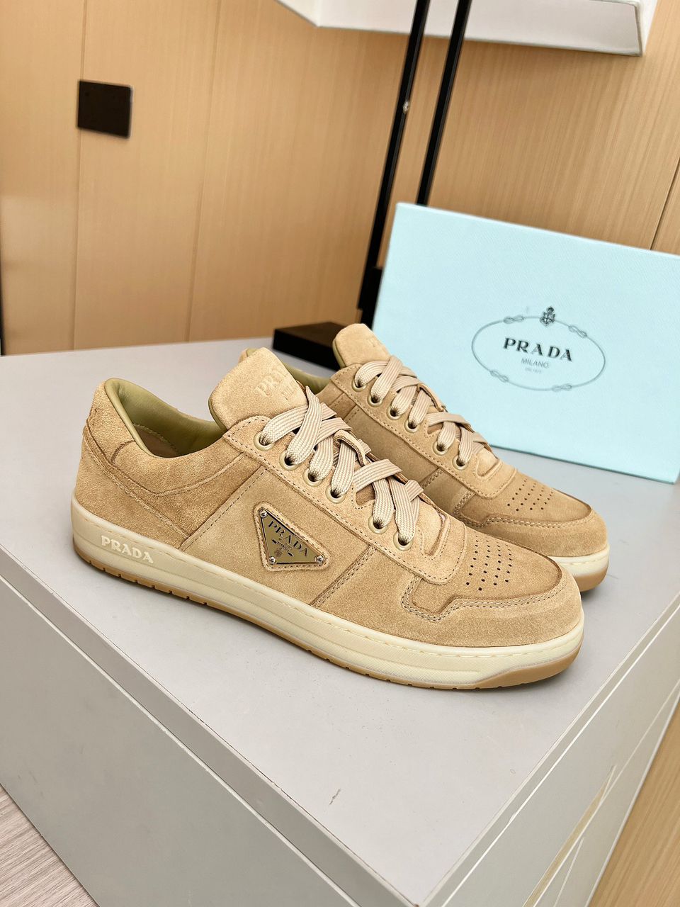 Prada Downtown beige.