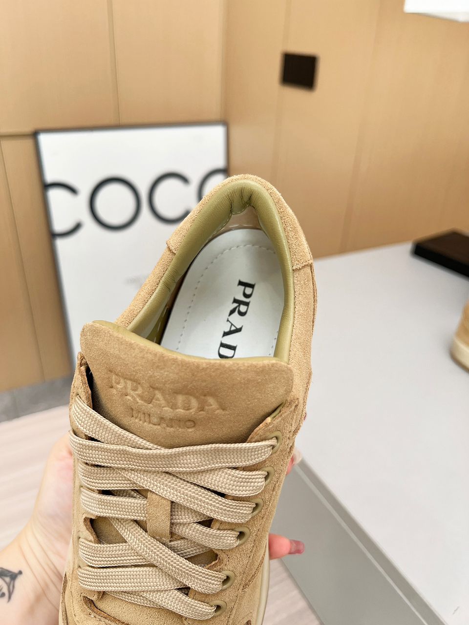 Prada Downtown beige.
