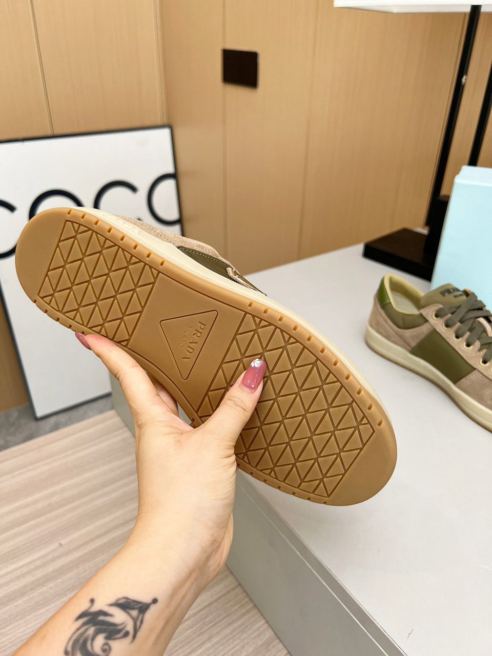 Prada Downtown beige.