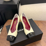 Chanel Cap-Toe Pump Off White e Preto. Salto 6,5 cm.