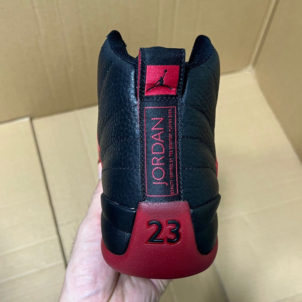 Air Jordan 12 Retro "Flu Game" (Varsity Red) .