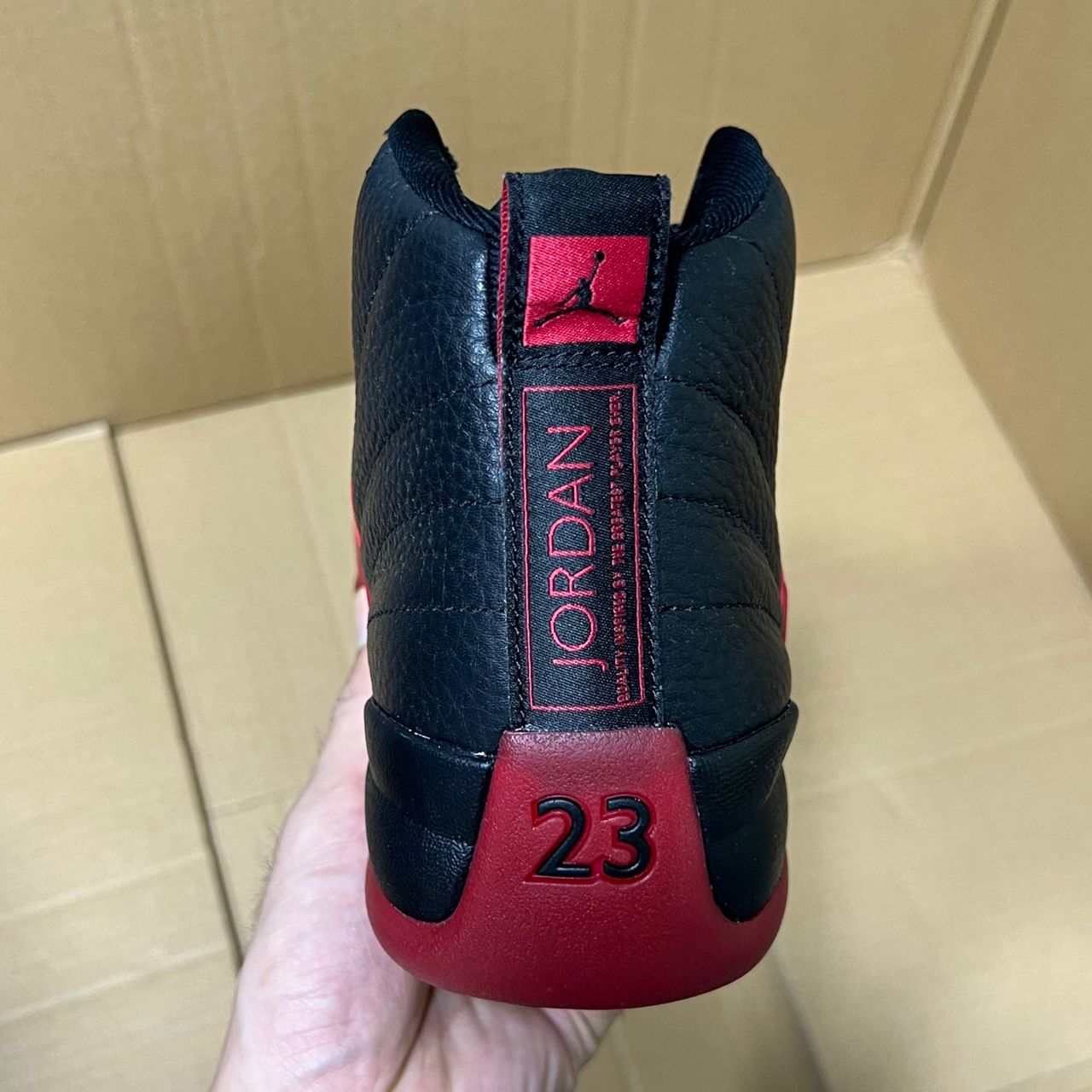 Air Jordan 12 Retro "Flu Game" (Varsity Red) .