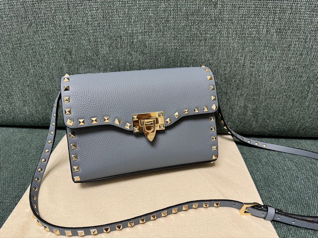 Valentino Garavani Rockstud Small Crossbody Bag Light Blue .
