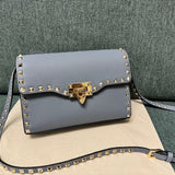 Valentino Garavani Rockstud Small Crossbody Bag Light Blue .