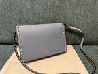 Valentino Garavani Rockstud Small Crossbody Bag Light Blue .