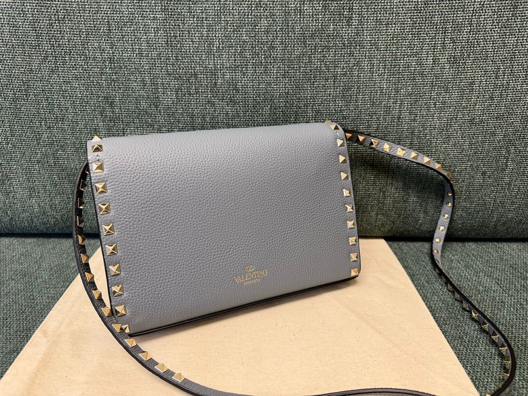 Valentino Garavani Rockstud Small Crossbody Bag Light Blue .