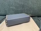 Valentino Garavani Rockstud Small Crossbody Bag Light Blue .