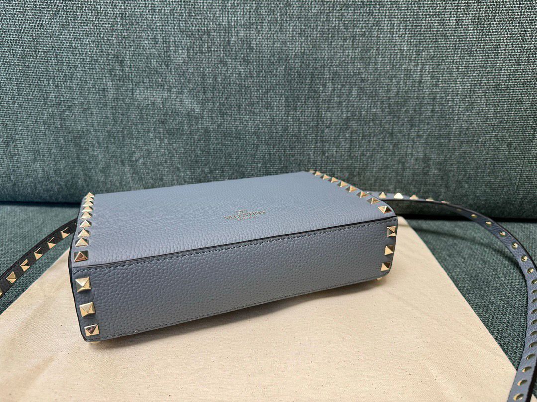 Valentino Garavani Rockstud Small Crossbody Bag Light Blue .