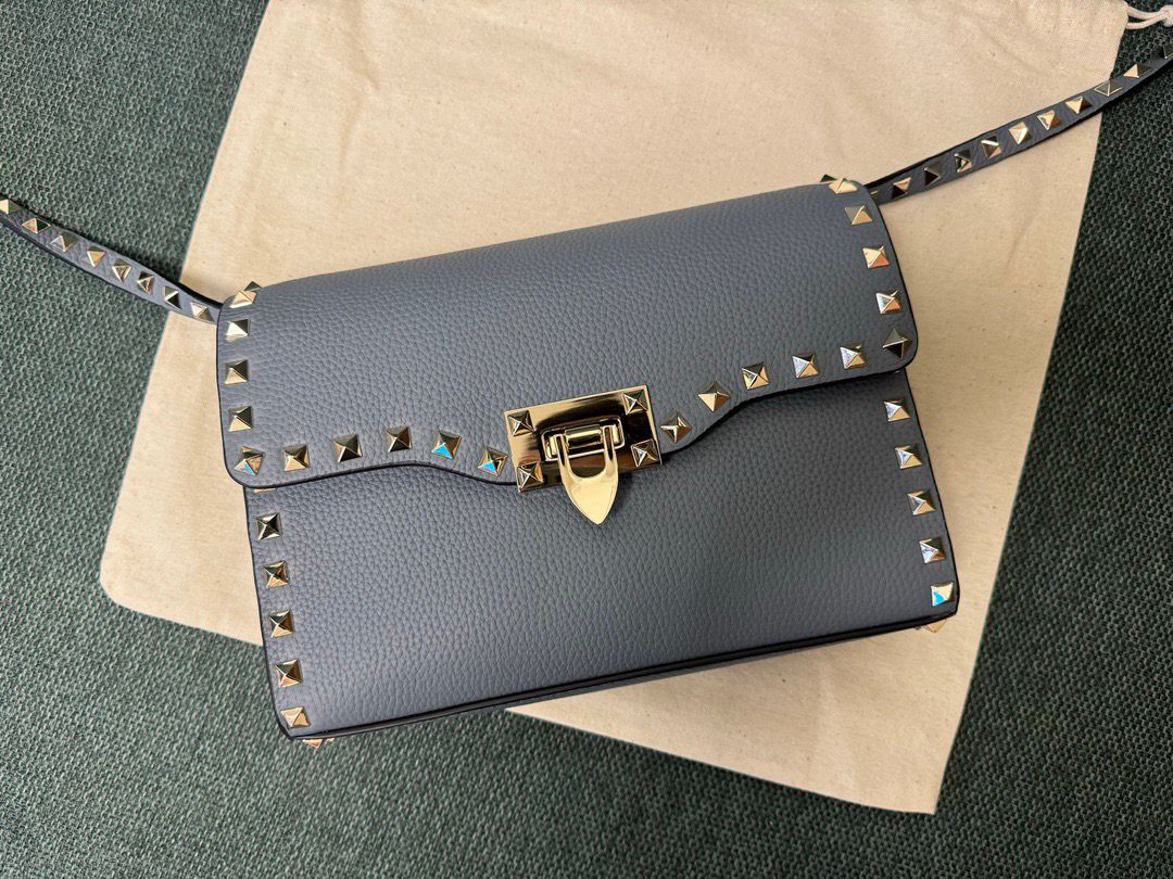 Valentino Garavani Rockstud Small Crossbody Bag Light Blue .