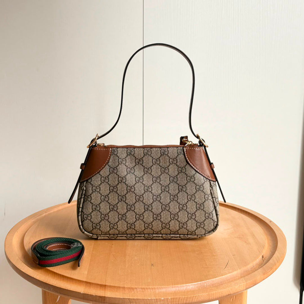 Gucci GG Emblem Small Shoulder Bag .