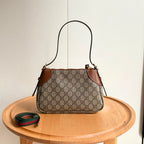 Gucci GG Emblem Small Shoulder Bag .