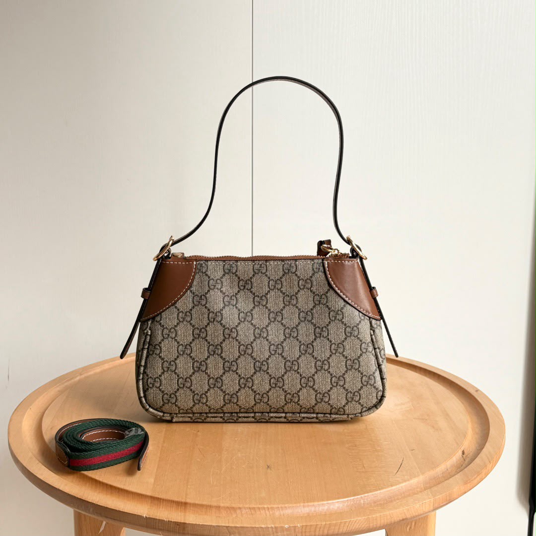 Gucci GG Emblem Small Shoulder Bag .