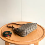 Gucci GG Emblem Small Shoulder Bag .