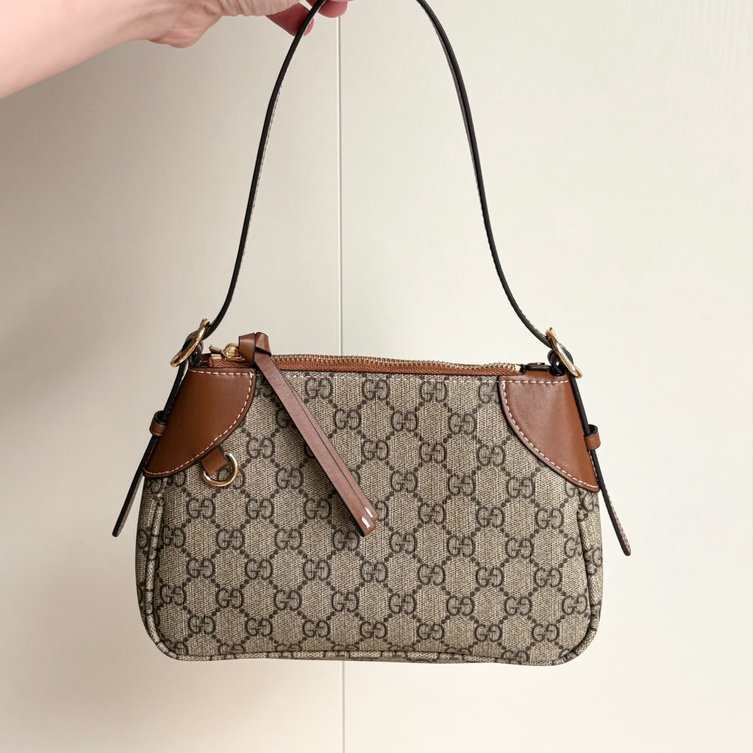 Gucci GG Emblem Small Shoulder Bag .