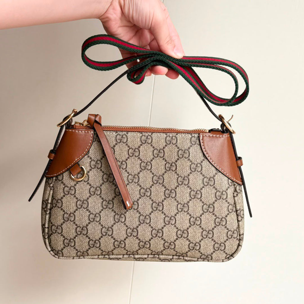 Gucci GG Emblem Small Shoulder Bag .