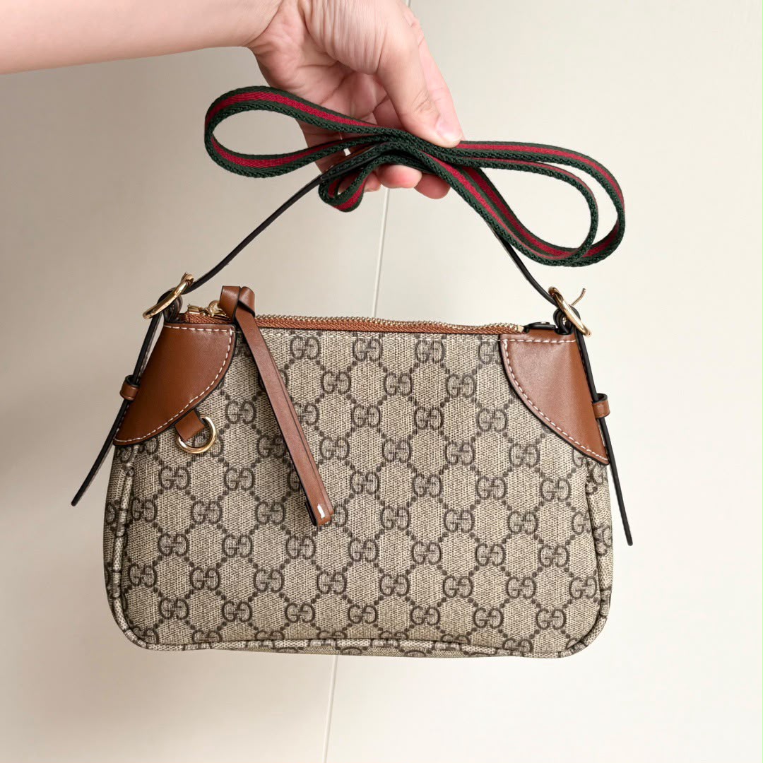 Gucci GG Emblem Small Shoulder Bag .