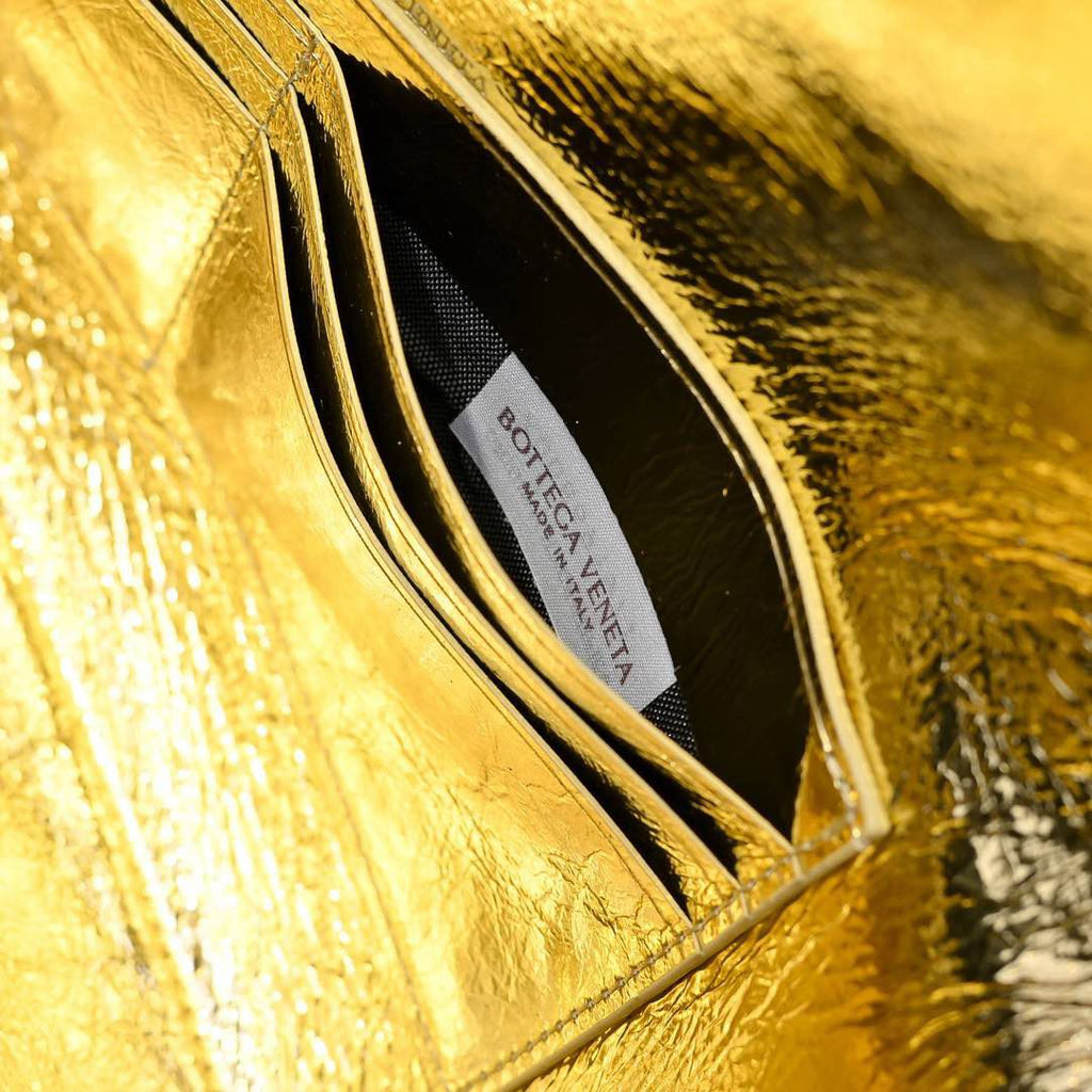 Bolsa Clutch Andiamo Champagne gold Bottega Veneta .