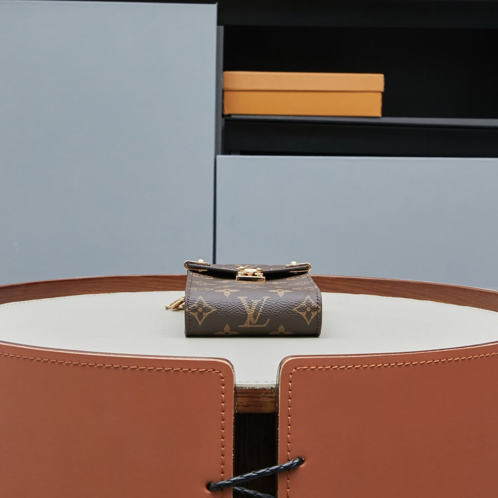 Bolsa Louis Vuitton Phone Pouch Métis Monogram