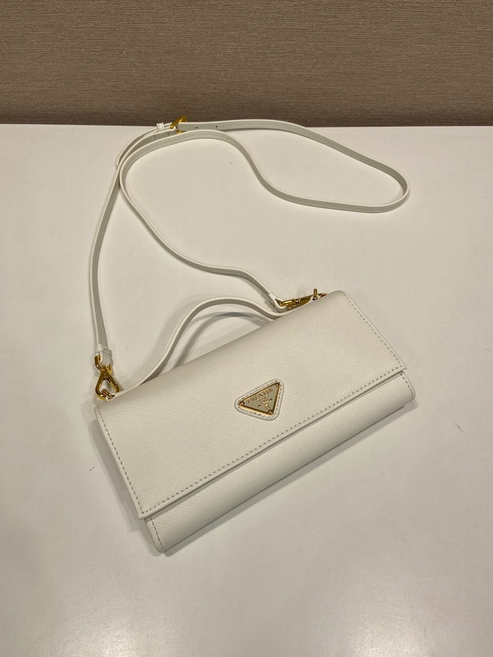 Carteira Prada Saffiano leather wallet with shoulder strap White .