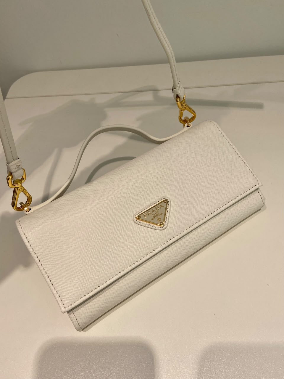 Carteira Prada Saffiano leather wallet with shoulder strap White .