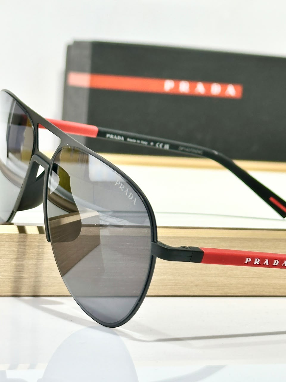 Óculos de Sol Prada Linear Rosa Preto