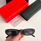 Óculos de sol YSL .
